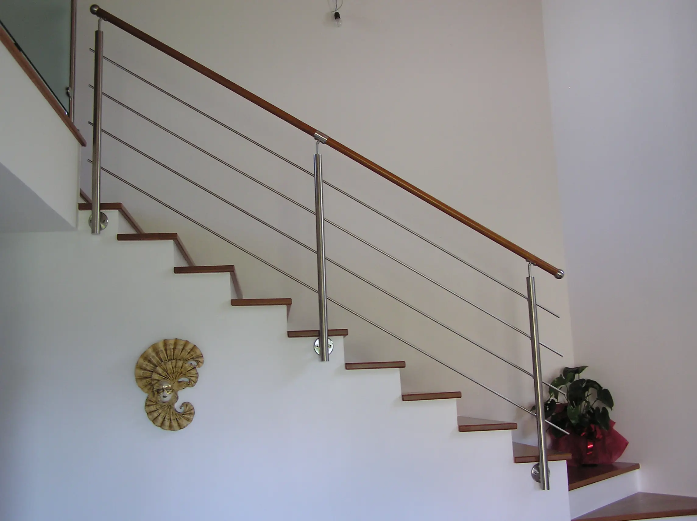 Parapetto inox con corrimano in legno
