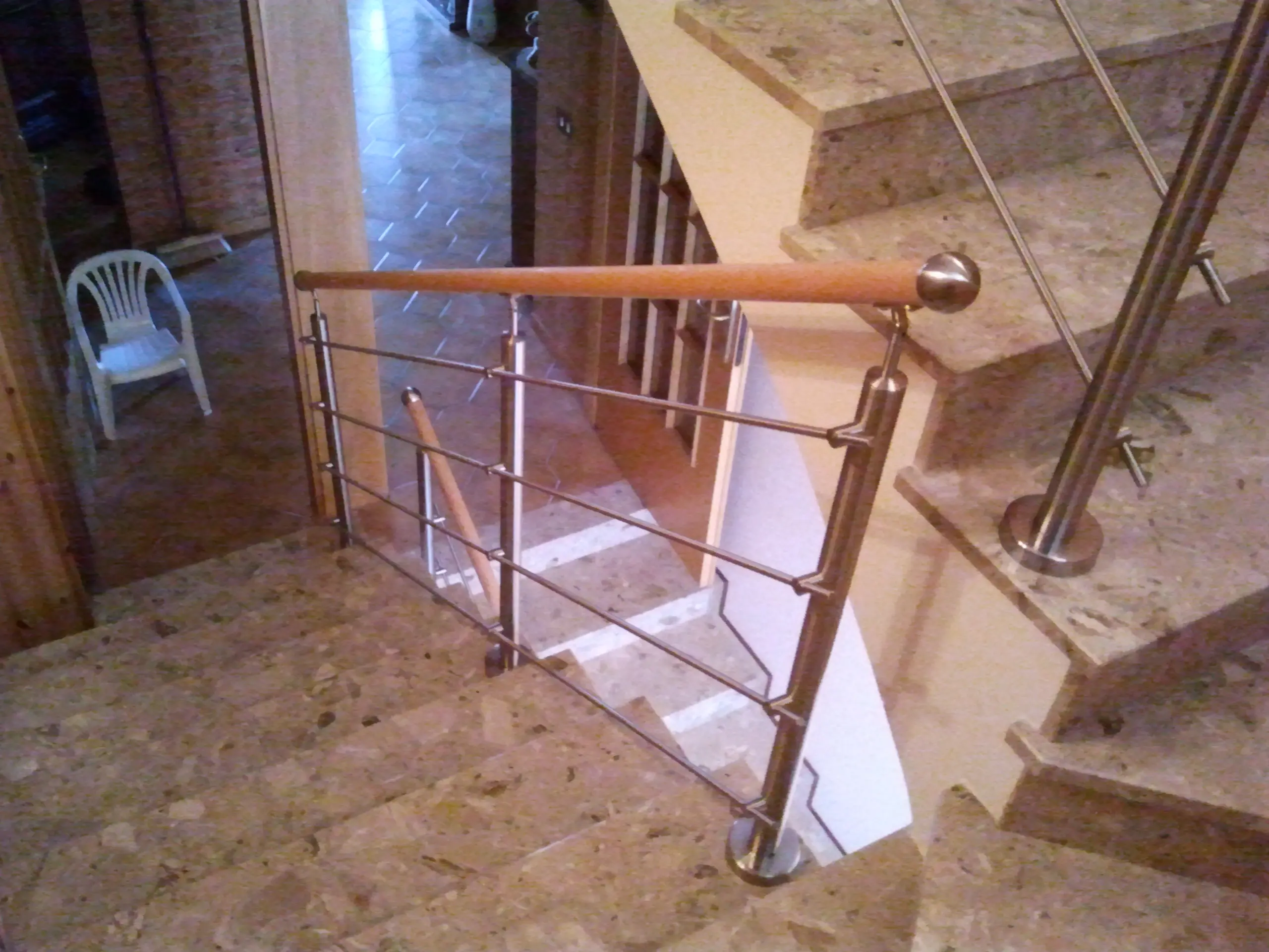 Parapetto in inox e corrimano legno